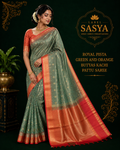 ROYAL PISTA GREEN AND ORANGE BUTTAS KACHI PATTU SAREE