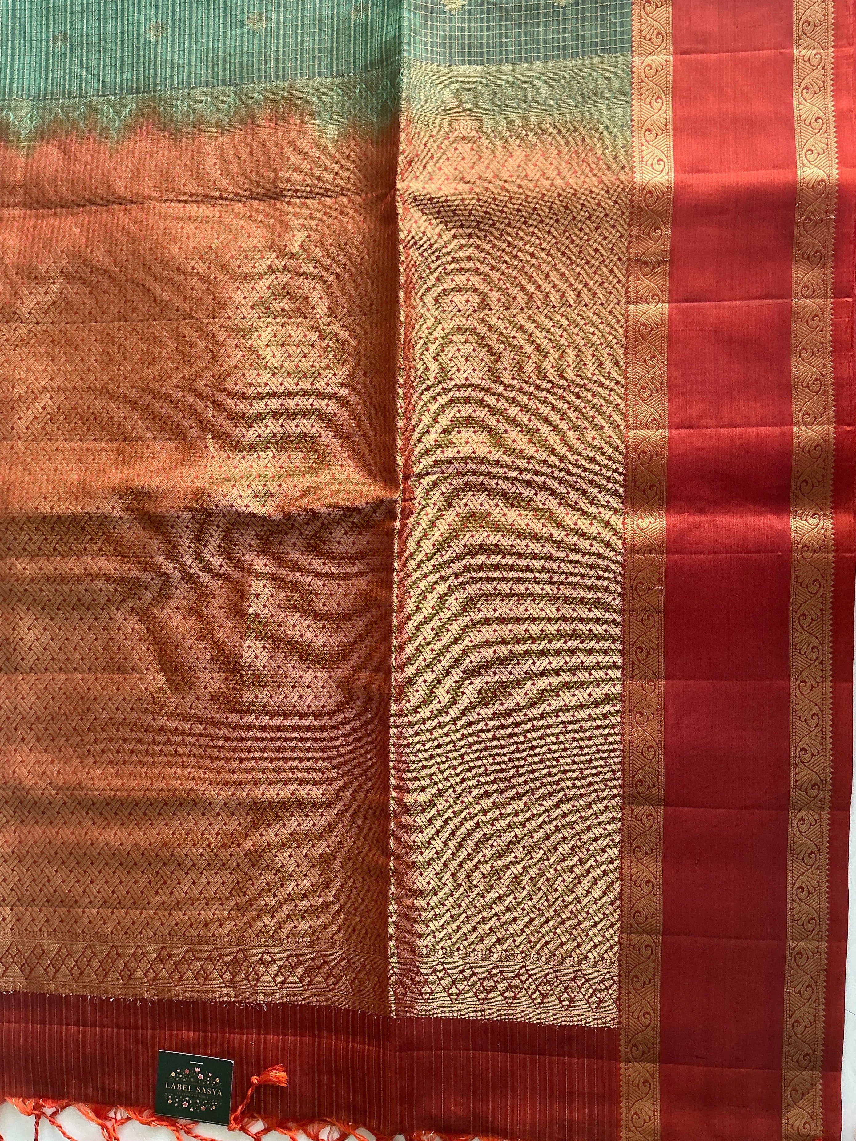 ROYAL PISTA GREEN AND ORANGE BUTTAS KACHI PATTU SAREE